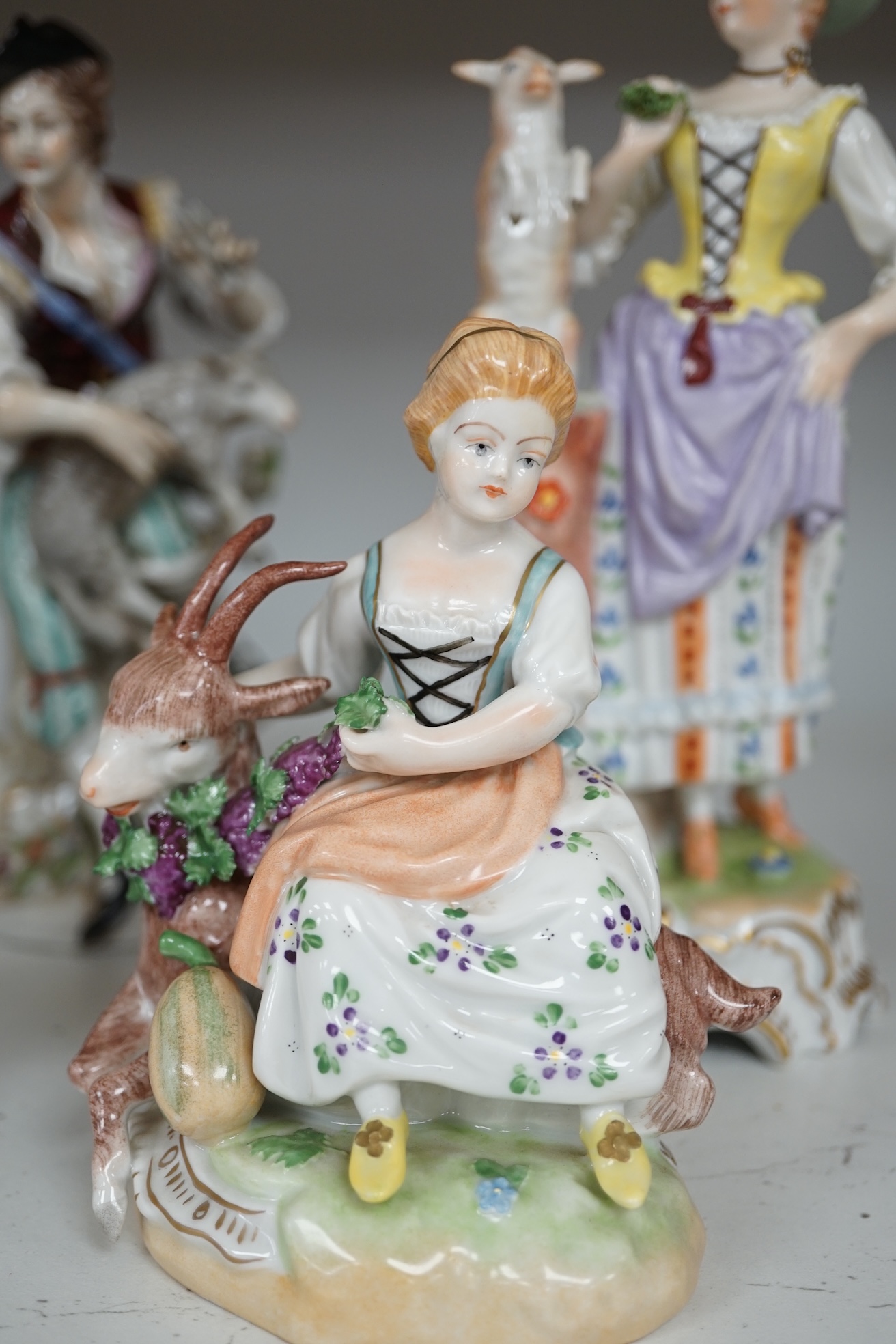 Six German porcelain figures by Sitzendorf, Dresden, etc. tallest 21.5 cm. Condition - good.